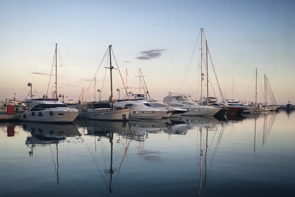Yachts moored at Limassol Marina at dusk