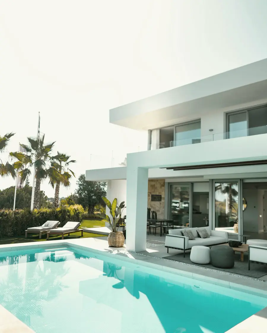 A finished villa with its pool and terrace
